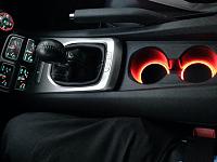 Cup holder illuminated mod.  Diode dynamics edge lit set up.