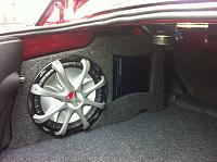 ******** stealth box subwoofer kit installed.  It took me about 3.5 to 4 hours to put it together, disassemble the trunk, and get this all wired up.  It pumps.  Kicker 12" woofer and kicker 400/1...