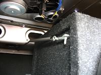 Sub box is locked in place with eye bolts in box, and spring-loaded locking hooks mounted to rear deck support rail with cable ties. Box can be easily removed, and hooks will attach to eye bolts in...