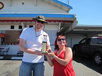 10 Foot Stork (Nate) receiving longest distance trophy from Ladybug's Mom at Wally's.