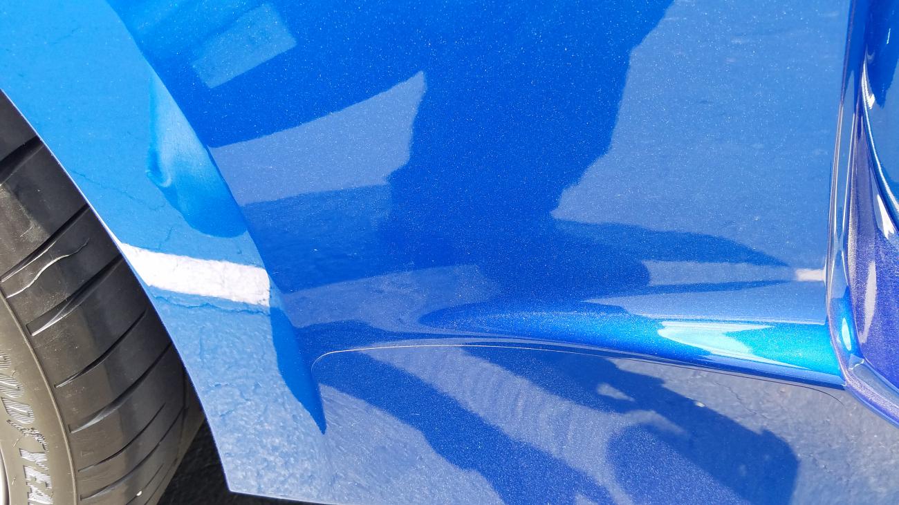 small rock chip. pass side rocker panel