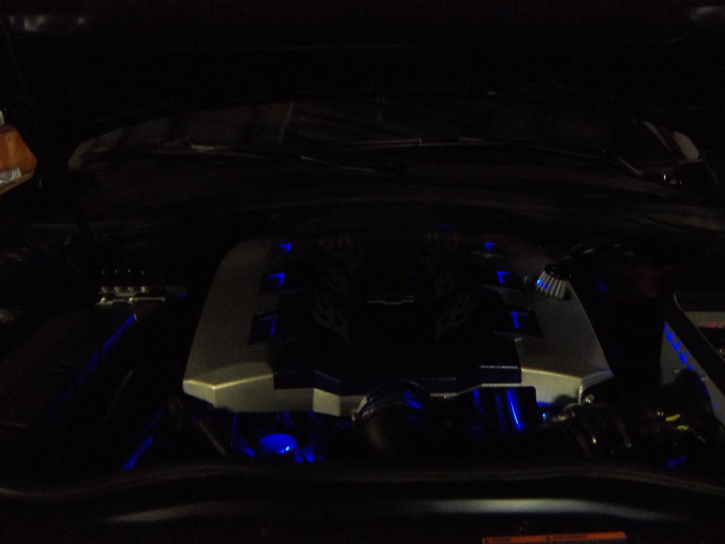 I added strips of blue lights under the engine cover. Looks good at night!