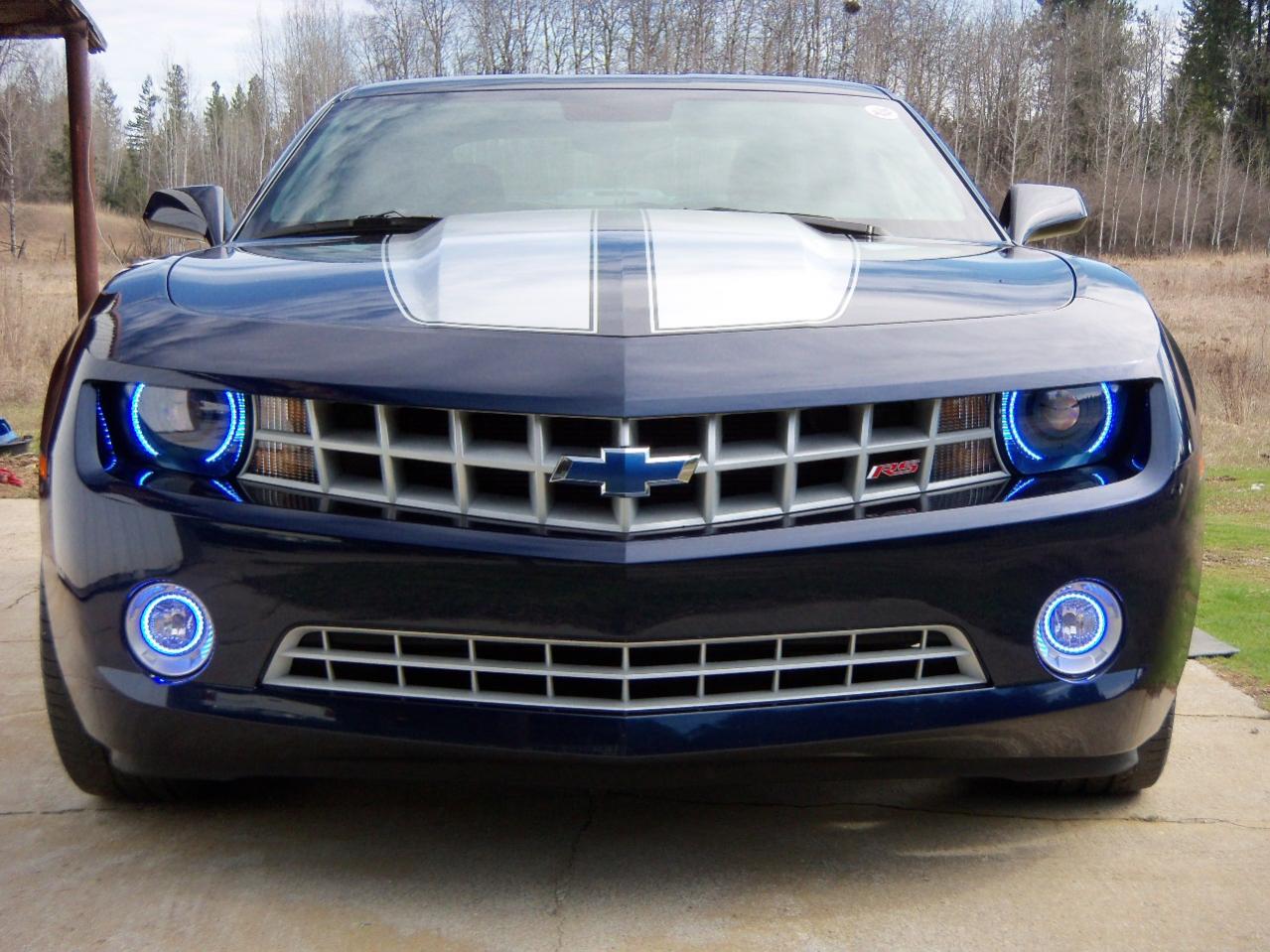 Painted the grills & bezels silver, headlight housing & bowtie painted blue, added the blue/white halos.